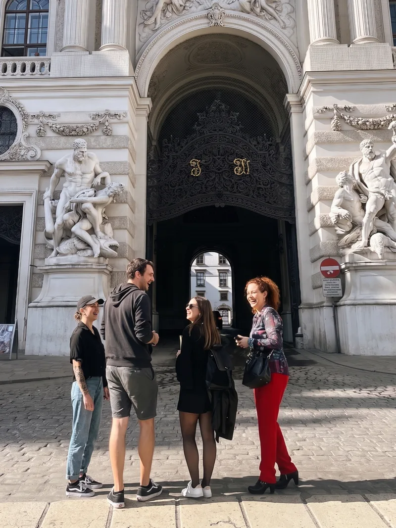 Team members collaborating on a Treasure Hunt challenge in Vienna